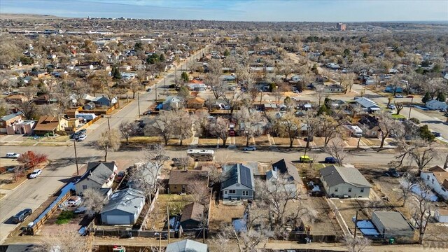 birds eye view of property with a residential view