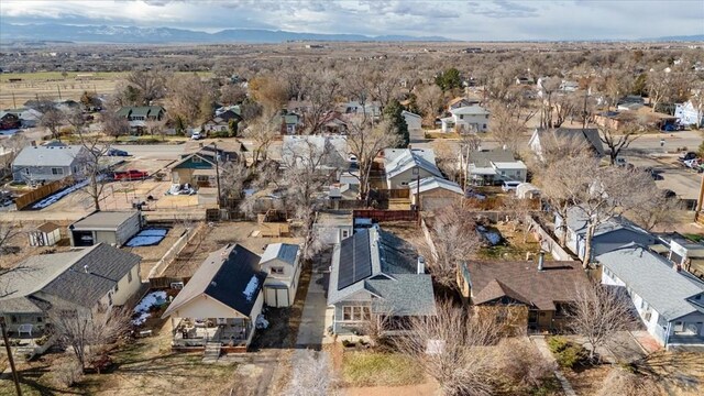 birds eye view of property featuring a residential view and a mountain view