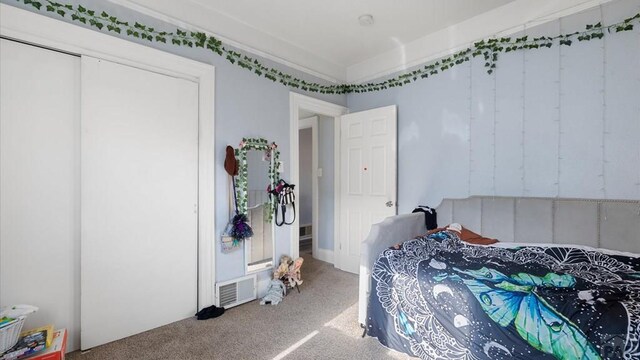 carpeted bedroom with visible vents