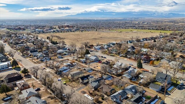 birds eye view of property featuring a residential view and a mountain view