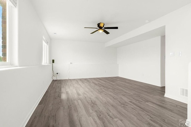 1090 E Linda Ave, Pueblo West, CO 81007 - empty room with wood finished floors, a ceiling fan, and baseboards