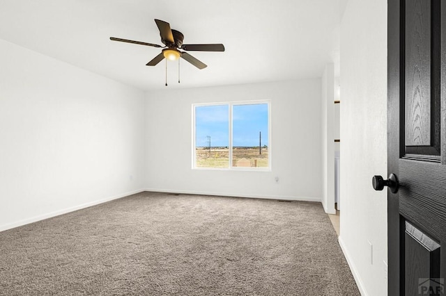 1090 E Linda Ave, Pueblo West, CO 81007 - unfurnished room featuring carpet flooring, ceiling fan, and baseboards
