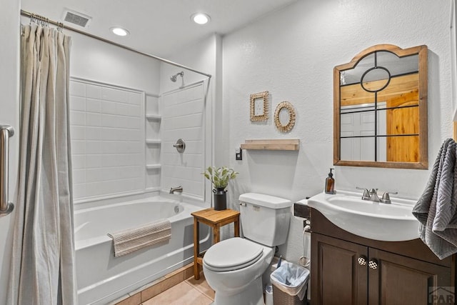 1800 Oak Grove Cir, Westcliffe, CO 81252 - bathroom featuring a textured wall, shower / tub combo with curtain, vanity, toilet, and tile patterned flooring