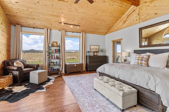 1800 Oak Grove Cir, Westcliffe, CO 81252 - bedroom featuring hardwood / wood-style flooring, multiple windows, wooden ceiling, and rail lighting