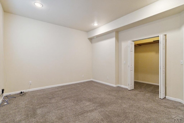 unfurnished bedroom with baseboards, carpet flooring, and recessed lighting