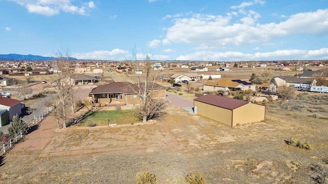 birds eye view of property featuring a residential view and a mountain view