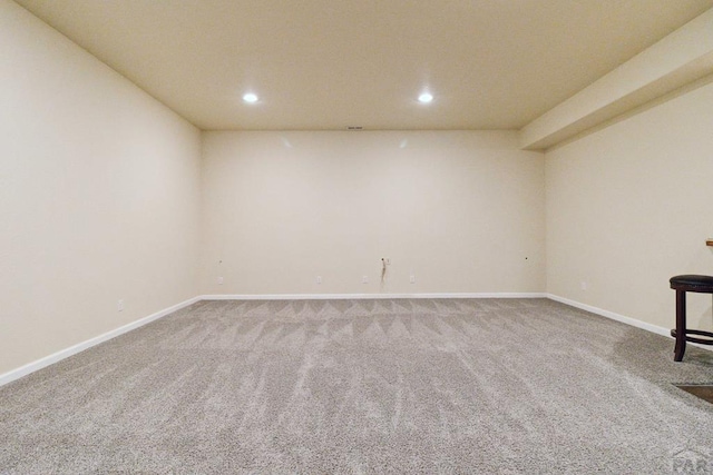 unfurnished room featuring carpet floors, recessed lighting, and baseboards