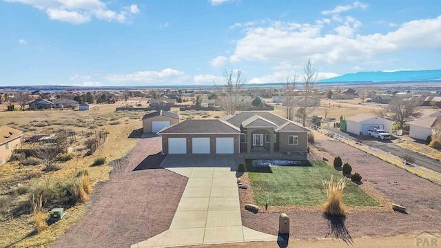 aerial view with a mountain view and a residential view