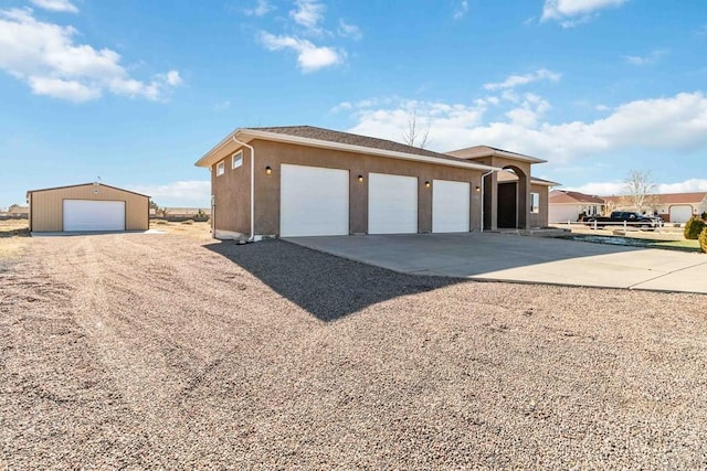 garage with driveway