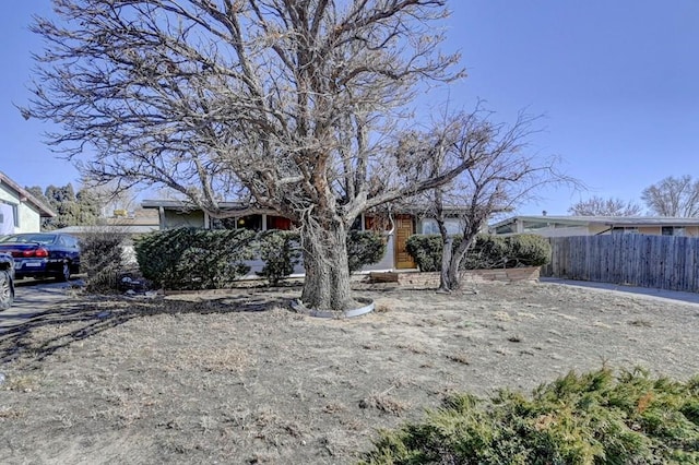 view of front of home with fence