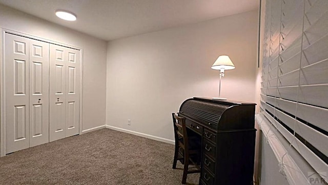 office area featuring carpet floors and baseboards