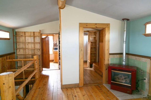 6705 County Rd 42, Del Norte, CO 81132 - hall featuring lofted ceiling, hardwood / wood-style floors, and a wainscoted wall