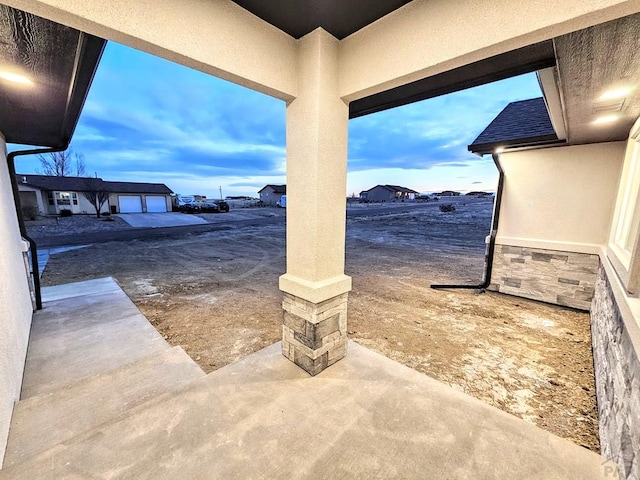 view of patio / terrace with an outbuilding