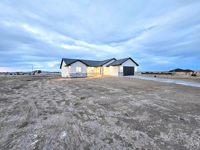 view of front of home with an attached garage and driveway