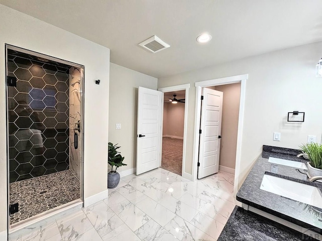 bathroom featuring visible vents, baseboards, a stall shower, marble finish floor, and a sink