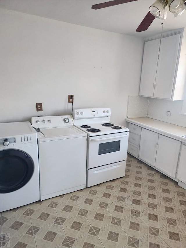 interior space with white electric range, washing machine and clothes dryer, light countertops, and white cabinets