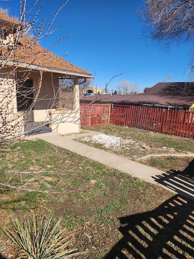 view of yard featuring fence