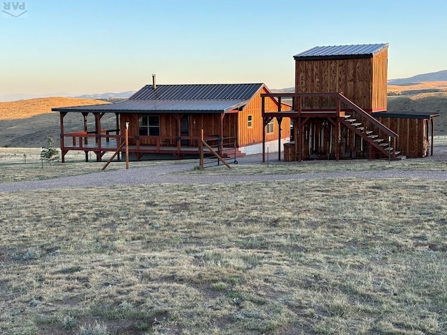 exterior space featuring a mountain view