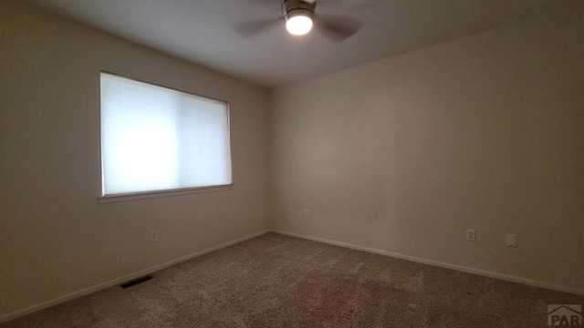 270 W Baldwyn Dr, Pueblo West, CO 81007 - spare room featuring ceiling fan, carpet flooring, and baseboards