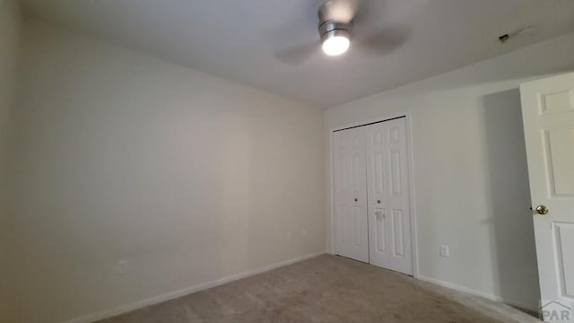 270 W Baldwyn Dr, Pueblo West, CO 81007 - unfurnished bedroom featuring a closet, baseboards, carpet, and a ceiling fan