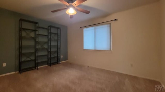 270 W Baldwyn Dr, Pueblo West, CO 81007 - carpeted spare room with ceiling fan and baseboards