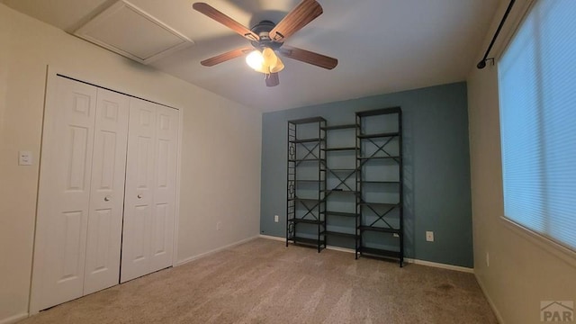 270 W Baldwyn Dr, Pueblo West, CO 81007 - unfurnished bedroom featuring carpet flooring, a closet, a ceiling fan, and baseboards