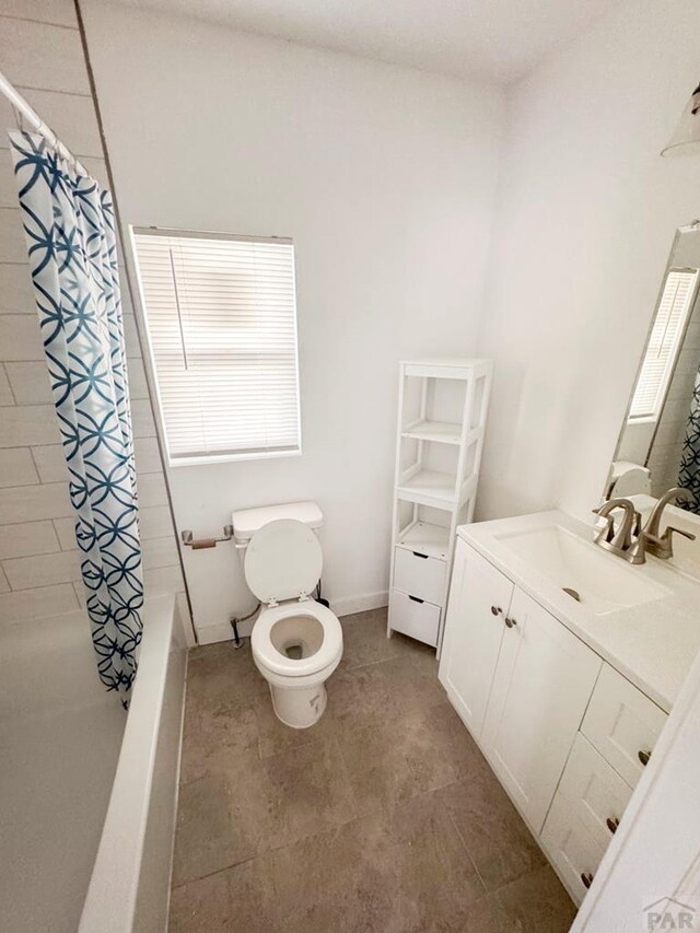 full bath with vanity, shower / bathtub combination with curtain, and toilet