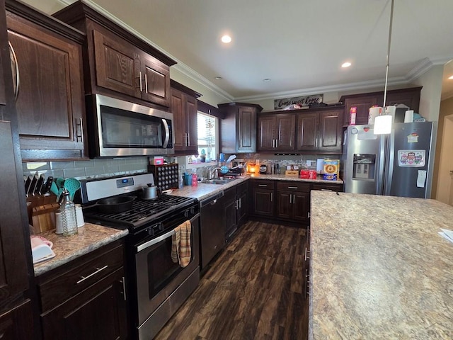 256 E First St, Hasty, CO 81044 - kitchen with ornamental molding, a sink, appliances with stainless steel finishes, and backsplash