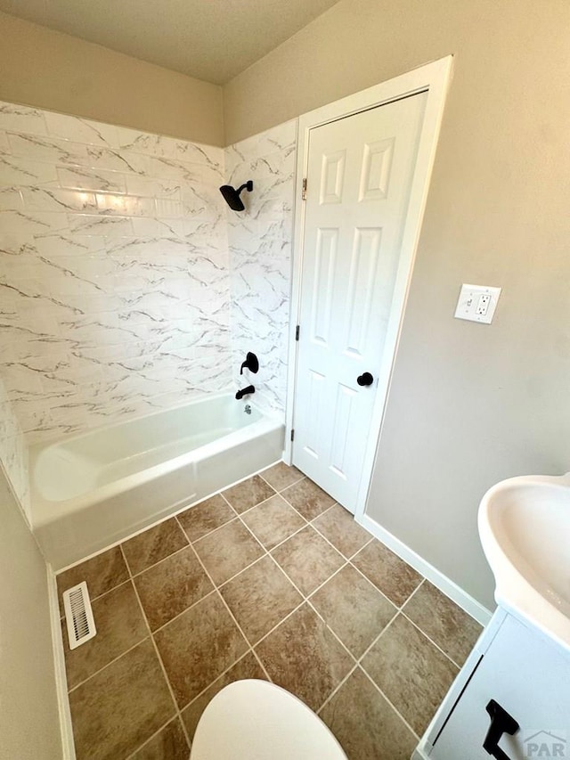 3923 Lancaster Dr, Pueblo, CO 81005 - bathroom with tile patterned flooring, tub / shower combination, and vanity