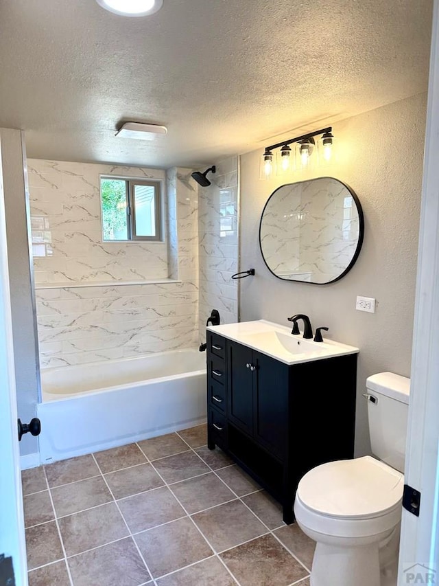 3923 Lancaster Dr, Pueblo, CO 81005 - bathroom featuring vanity, a textured ceiling,  shower combination, and tile patterned floors
