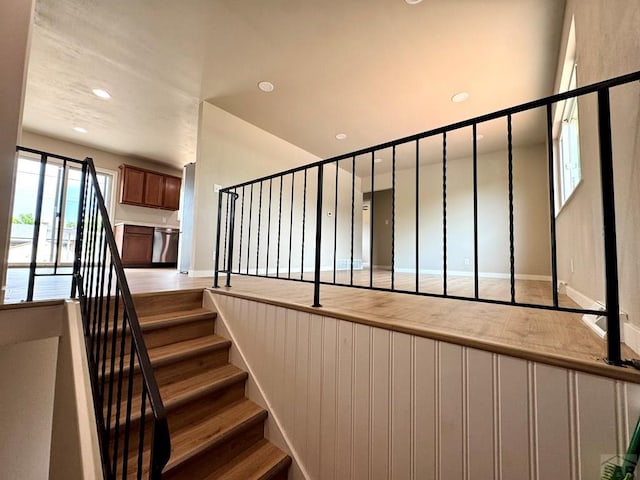 3923 Lancaster Dr, Pueblo, CO 81005 - stairway featuring baseboards and recessed lighting