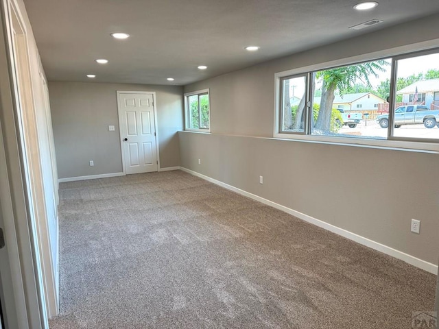 3923 Lancaster Dr, Pueblo, CO 81005 - empty room featuring recessed lighting and light carpet