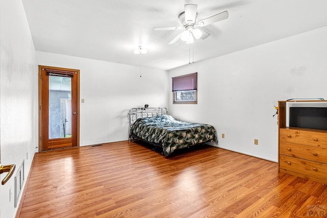 600 Hewitt St, Pueblo, CO 81005 - bedroom with multiple windows, ceiling fan, light wood-style flooring, and visible vents