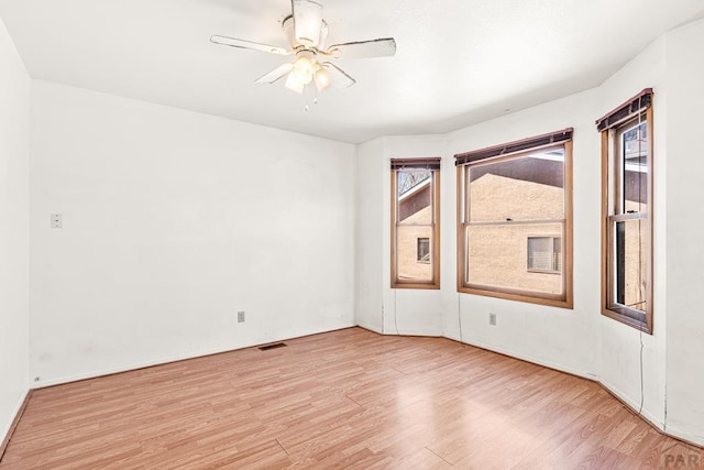 600 Hewitt St, Pueblo, CO 81005 - spare room with wood finished floors, ceiling fan, and visible vents