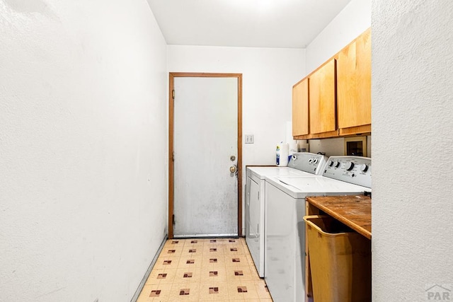 600 Hewitt St, Pueblo, CO 81005 - washroom featuring cabinet space, light floors, and washing machine and clothes dryer