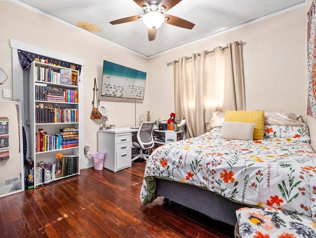 bedroom featuring wood-type flooring and ceiling fan