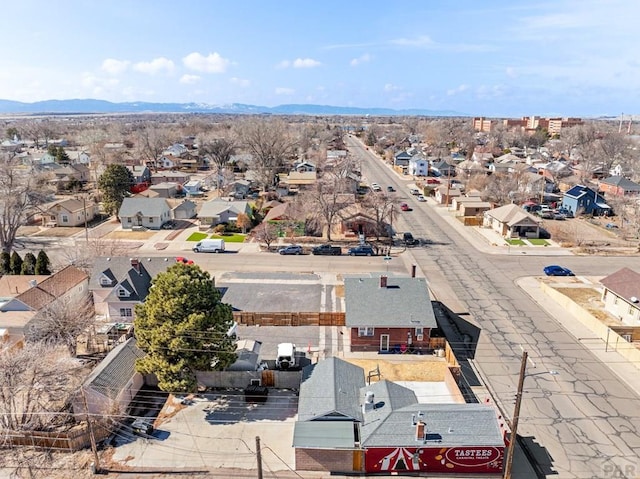 drone / aerial view with a residential view and a mountain view