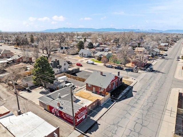 drone / aerial view with a residential view and a mountain view