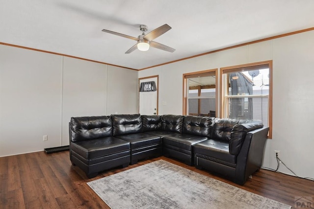 living room featuring dark wood-style floors, crown molding, and ceiling fan