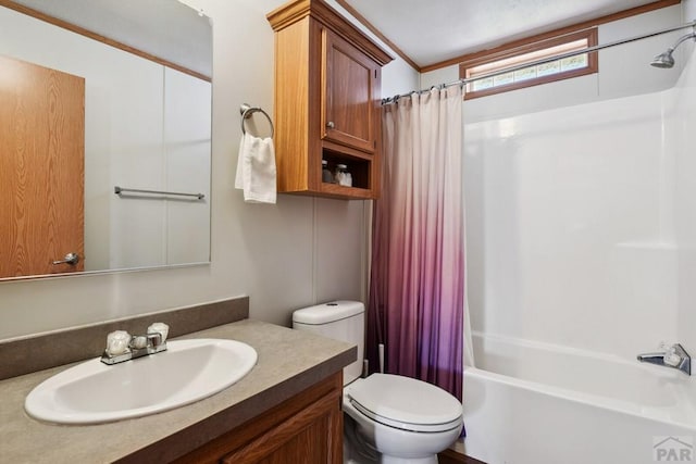 full bath featuring toilet, shower / bathtub combination with curtain, and vanity