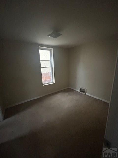 1045 Berkley Ave, Pueblo, CO 81004 - unfurnished room with baseboards and carpet flooring