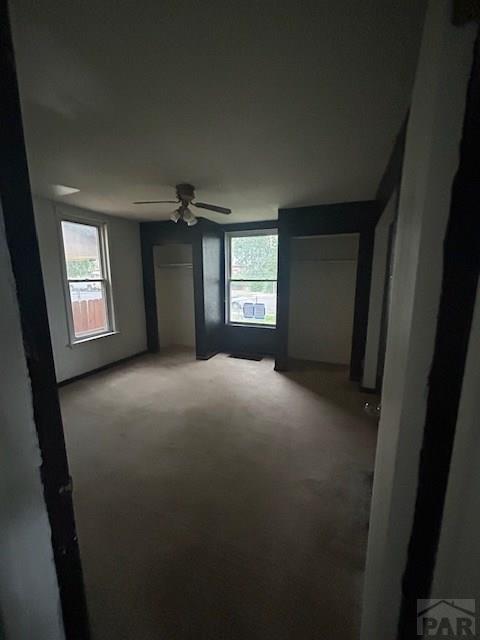 1045 Berkley Ave, Pueblo, CO 81004 - unfurnished room with carpet floors and ceiling fan