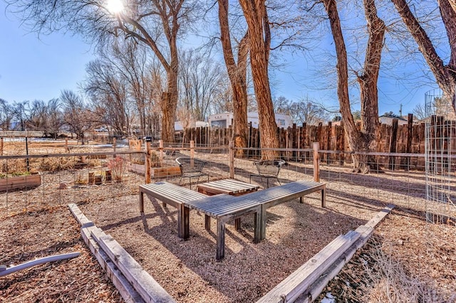 view of yard featuring a garden and fence