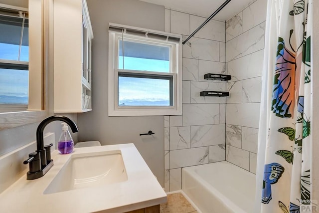 full bathroom featuring shower / tub combo and vanity