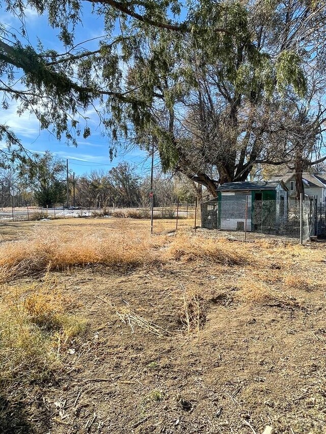 view of yard with a rural view