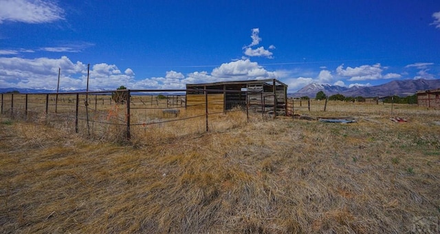 4131 County Rd 510, Walsenburg, CO 81055 - view of outdoor structure with an outdoor structure, an exterior structure, a mountain view, and a rural view