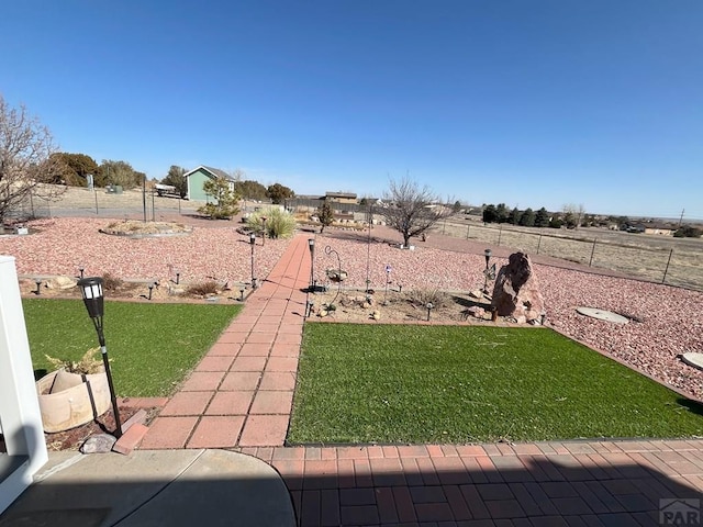 view of yard with fence