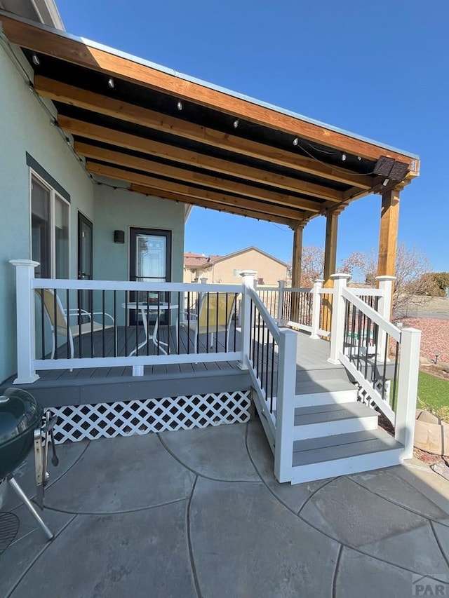 view of patio / terrace featuring area for grilling and a wooden deck