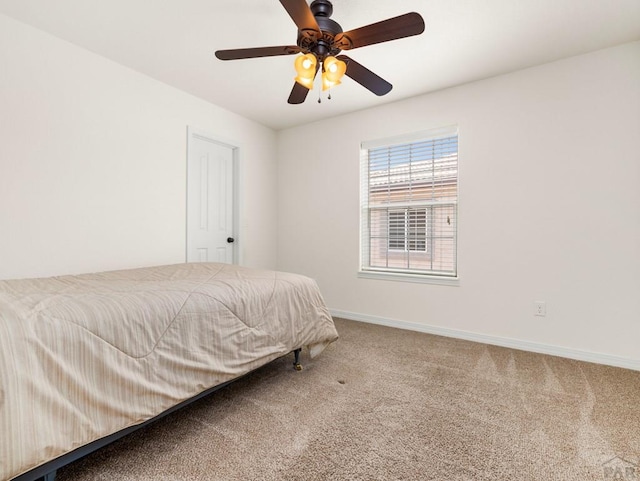 5522 Ventana Ct, Pueblo, CO 81005 - carpeted bedroom featuring baseboards and ceiling fan