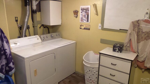 laundry area featuring laundry area and washer and clothes dryer